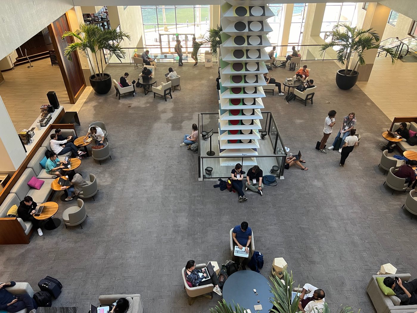Overhead view of the EMNLP 2024 venue lobby and seating area