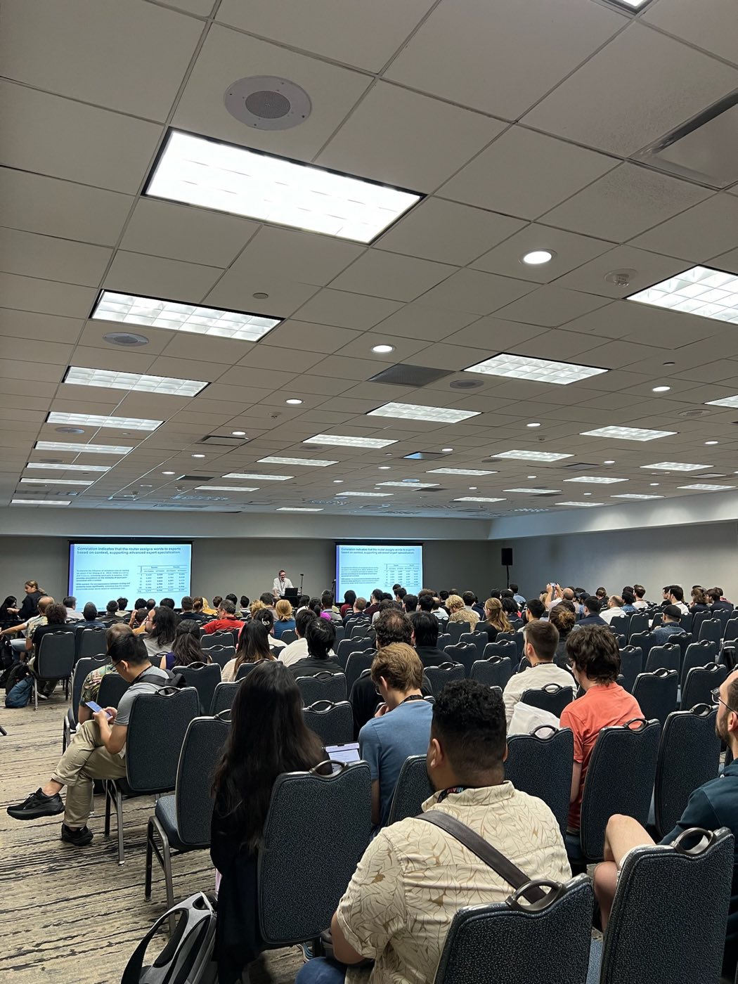 Large audience attending a keynote session at EMNLP 2024