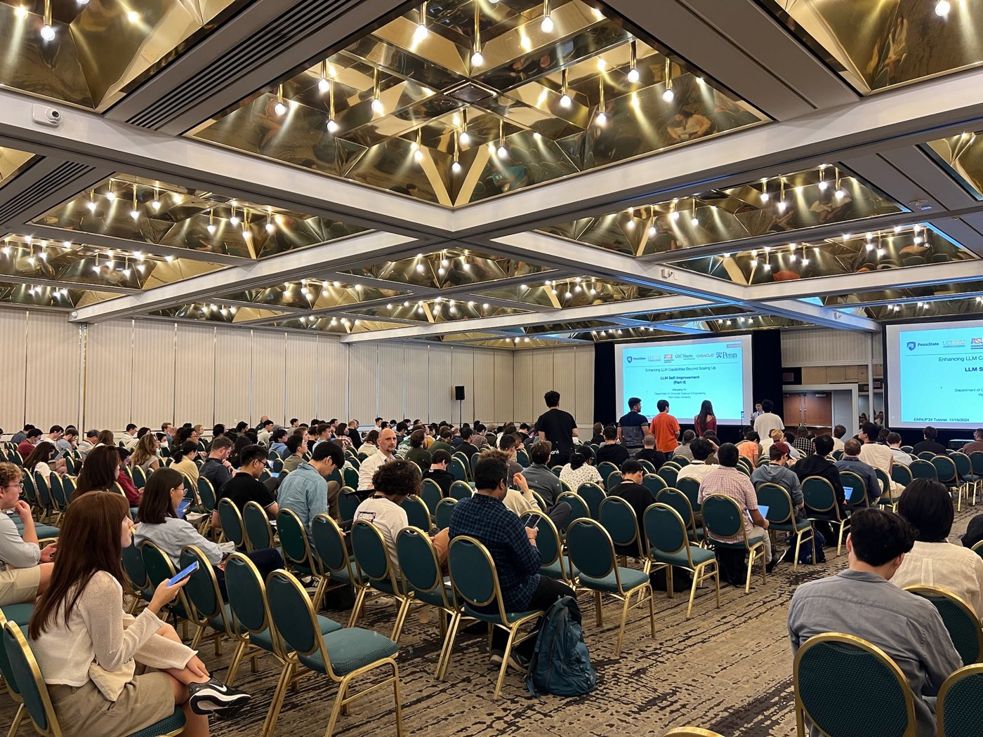 Attendees seated for a paper presentation at EMNLP 2024