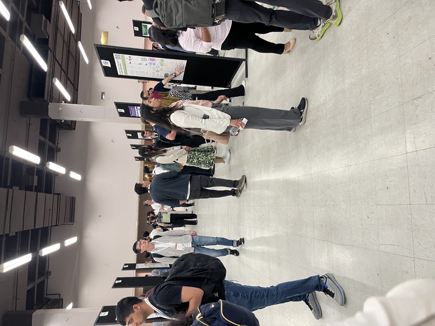 Wide view of the NAACL 2025 poster session hall in Albuquerque