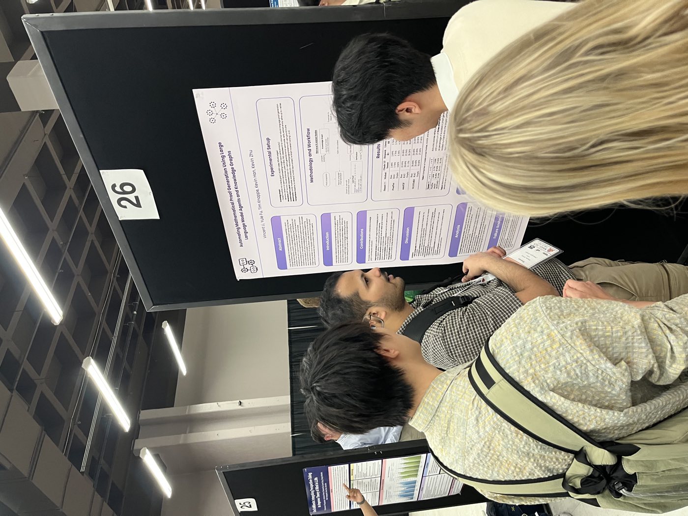Algoverse students discussing research poster with attendee at NAACL 2025