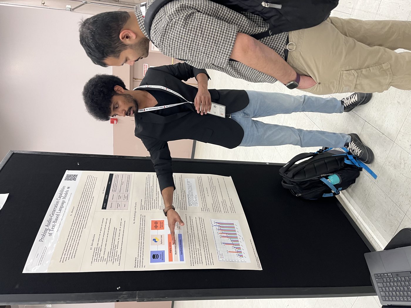 Algoverse student explaining research poster to attendee at NAACL 2025