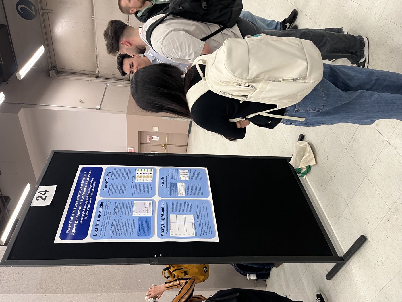 Algoverse students presenting research poster to attendees at NAACL 2025
