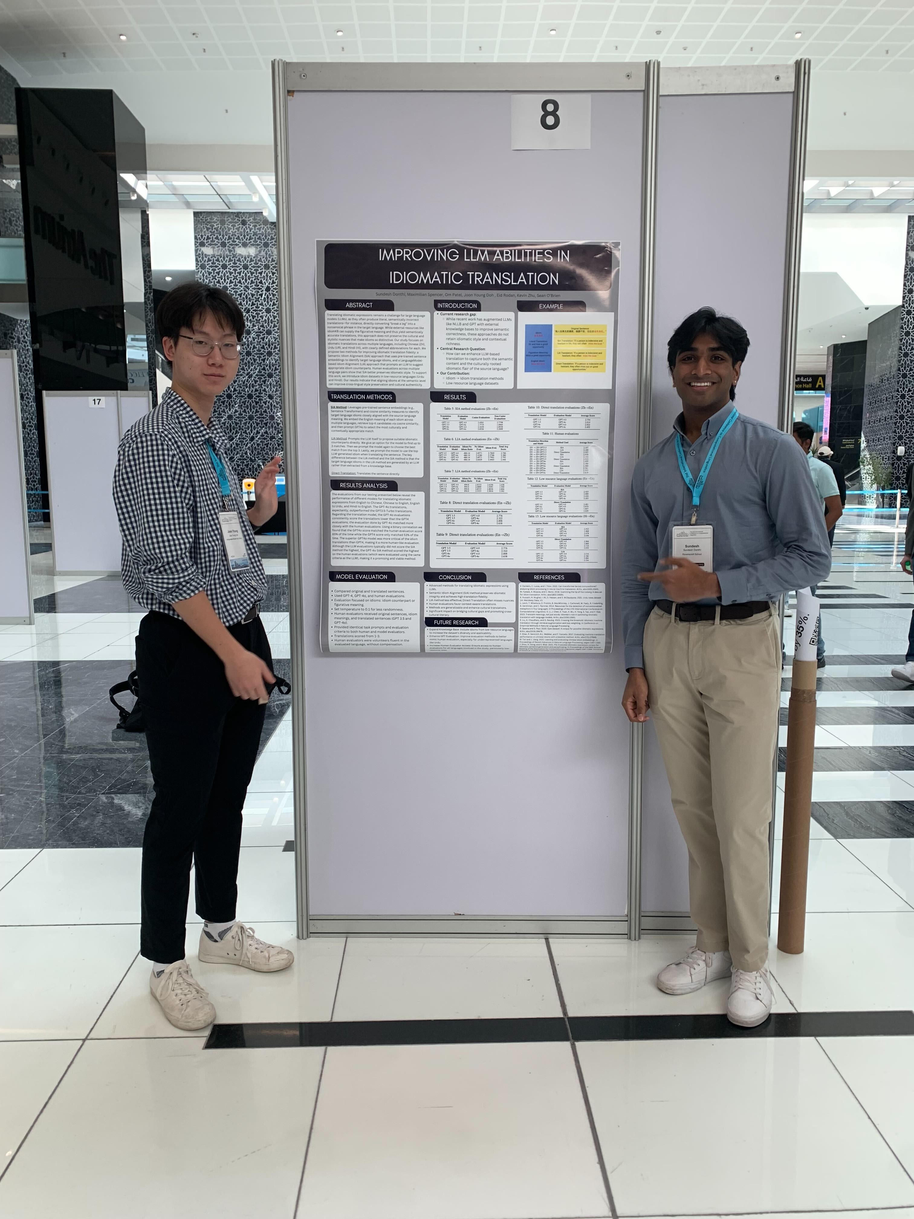 Students presenting Idiomatic Translation research poster